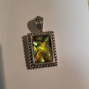 Vintage-Inspired Silver Necklace with Color-Shifting Gemstone